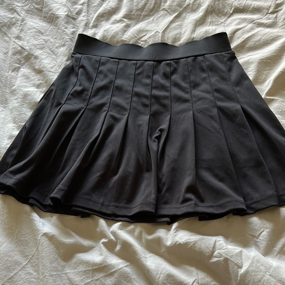 Elegant Black Pleated Skirt by Indero